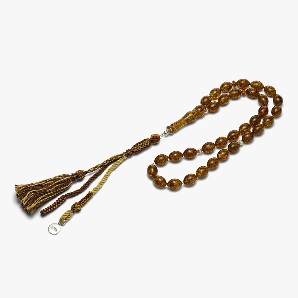 سبحة كهرمان (لوز) مع كركوشة بنية وتطعيمات فضة - الصورة 2